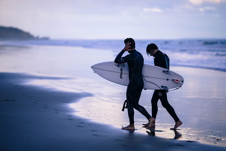 men with surfboard