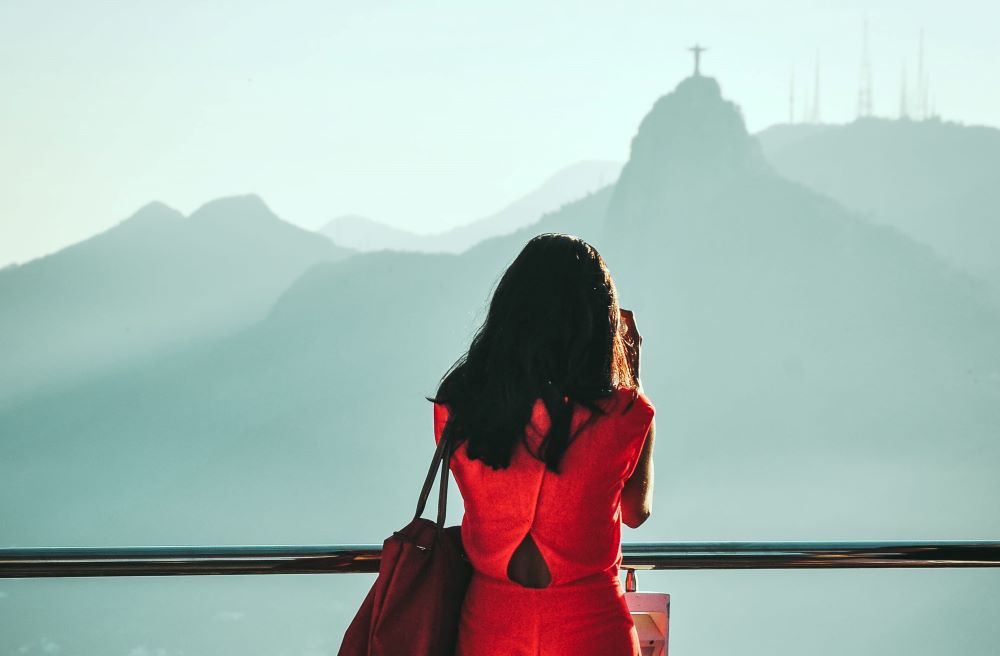 Woman looking at Christ the Redeemer